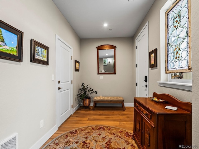 6162 W 28th Ct, Edgewater, CO 80214 - entrance foyer featuring wood finished floors, baseboards, and recessed lighting