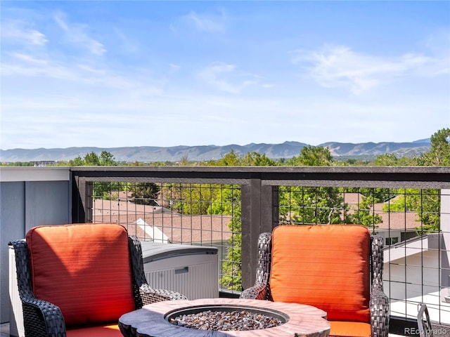 6162 W 28th Ct, Edgewater, CO 80214 - balcony with an outdoor fire pit and a mountain view