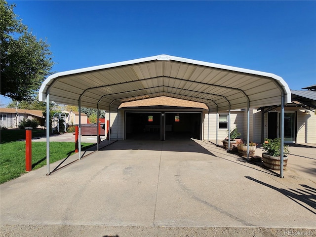 view of parking with a garage and a carport