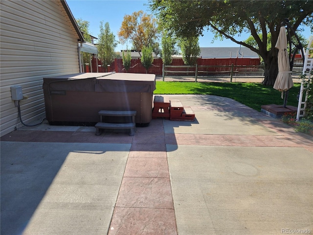 view of patio with a hot tub