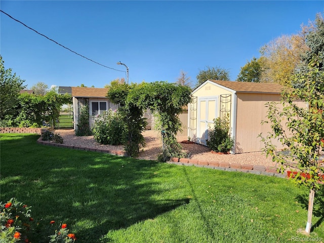 view of yard with a storage shed