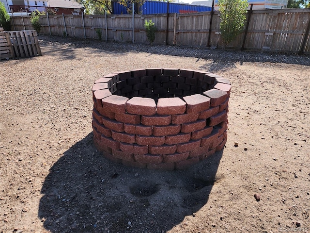 exterior details with a fire pit