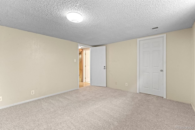 interior space featuring a textured ceiling