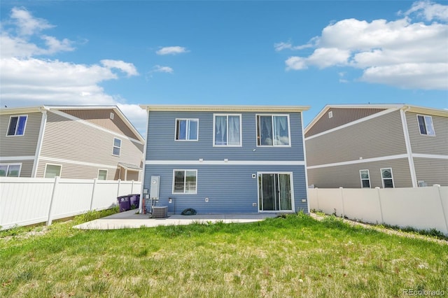 5571 Killarney St, Denver, CO 80249 - back of house with a patio area and central AC