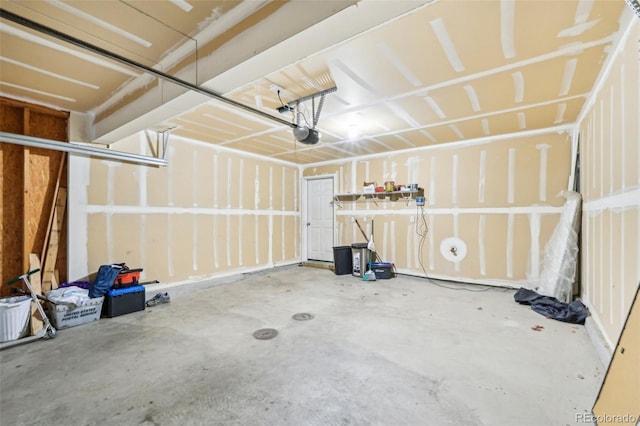 5571 Killarney St, Denver, CO 80249 - garage with a garage door opener