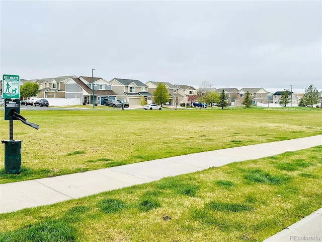 5571 Killarney St, Denver, CO 80249 - view of home's community featuring a residential view and a lawn