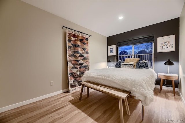 bedroom with light hardwood / wood-style flooring