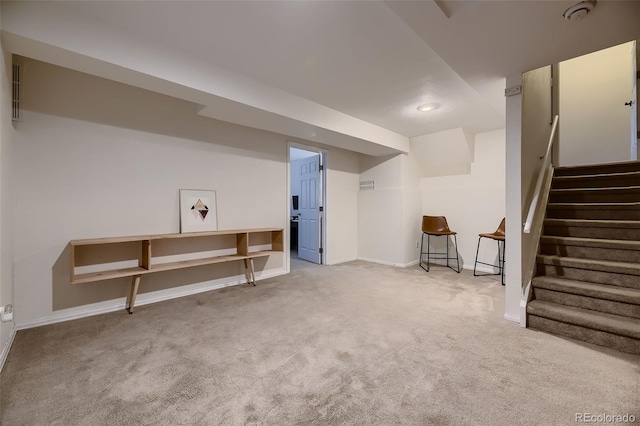 basement with carpet flooring