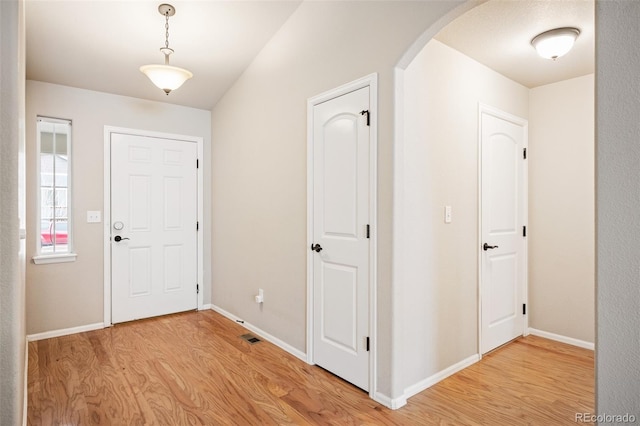 foyer entrance featuring light hardwood / wood-style flooring