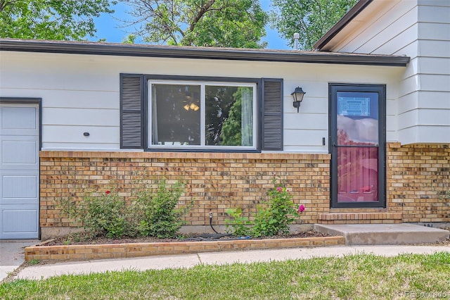 229 Ranae Dr, Loveland, CO 80537 - entrance to property with brick siding