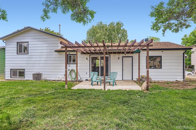 229 Ranae Dr, Loveland, CO 80537 - rear view of house with a pergola, a patio, a lawn, and central AC