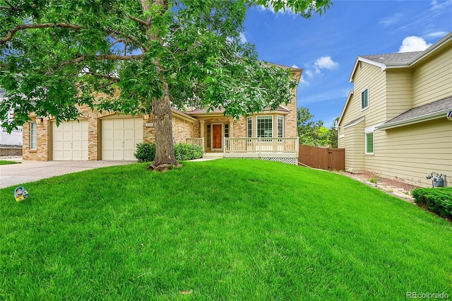 2316 Weatherstone Cir, Highlands Ranch, CO 80126 - view of front facade featuring driveway, a porch, brick siding, and an attached garage