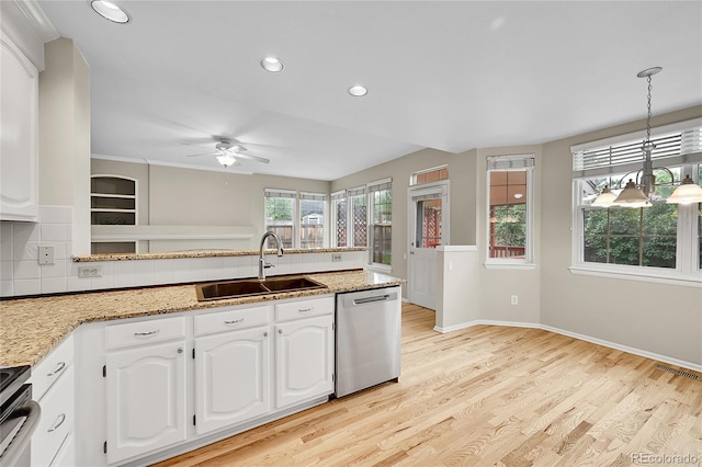 2316 Weatherstone Cir, Highlands Ranch, CO 80126 - kitchen with stainless steel appliances, decorative backsplash, ceiling fan, light wood-style flooring, and recessed lighting