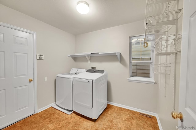 2316 Weatherstone Cir, Highlands Ranch, CO 80126 - laundry area featuring washing machine and dryer and baseboards