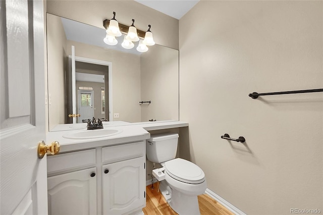 2316 Weatherstone Cir, Highlands Ranch, CO 80126 - half bathroom with wood finished floors and vanity