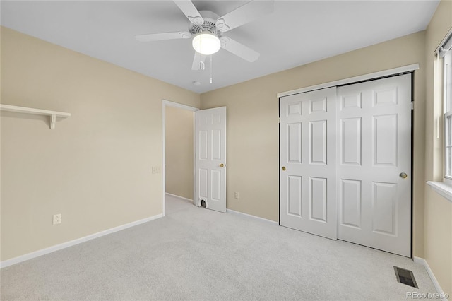 2316 Weatherstone Cir, Highlands Ranch, CO 80126 - unfurnished bedroom featuring light colored carpet, a closet, and a ceiling fan