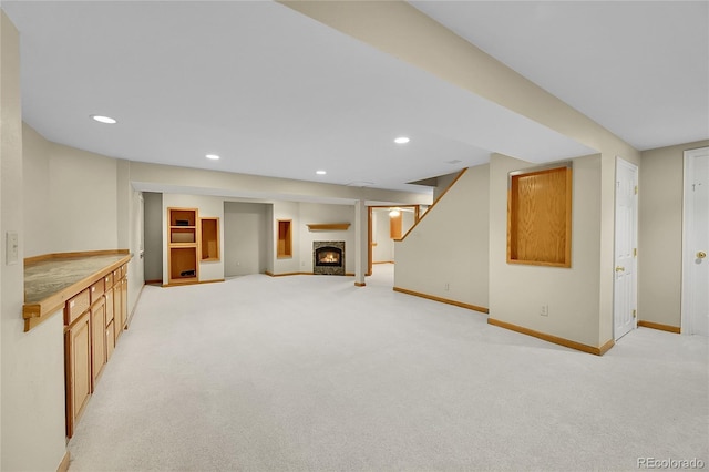 2316 Weatherstone Cir, Highlands Ranch, CO 80126 - finished basement with light carpet, a fireplace, and recessed lighting