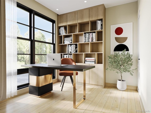 office area with light wood-type flooring