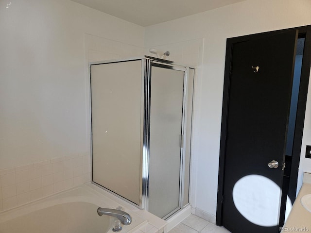 bathroom with tile patterned flooring and plus walk in shower