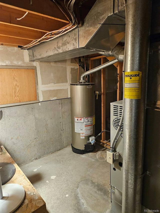 utility room featuring gas water heater