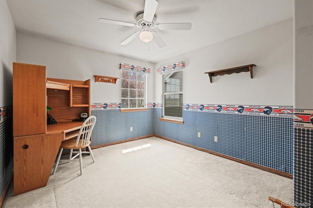5723 S Everett Way, Littleton, CO 80123 - home office featuring a wainscoted wall, light colored carpet, and a ceiling fan