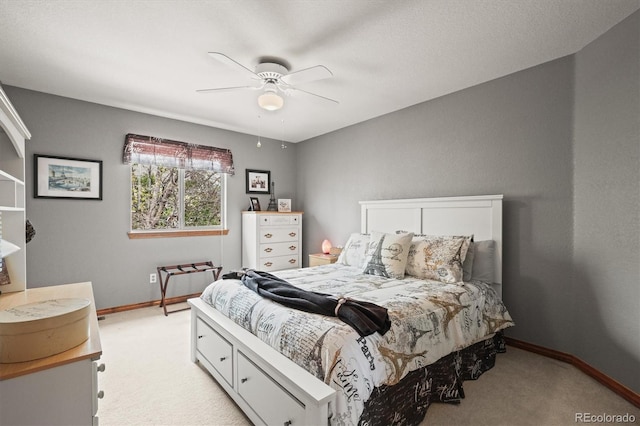 5723 S Everett Way, Littleton, CO 80123 - bedroom with light carpet, baseboards, and a ceiling fan