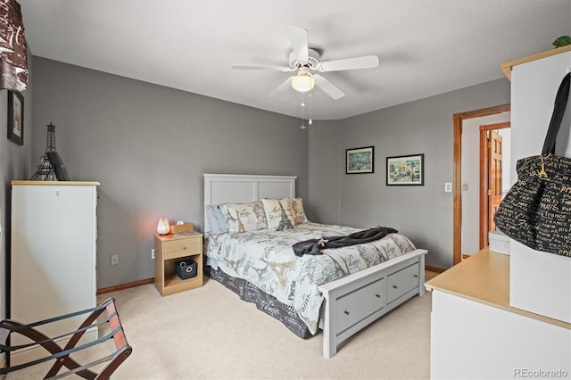 5723 S Everett Way, Littleton, CO 80123 - bedroom with light carpet, baseboards, and a ceiling fan