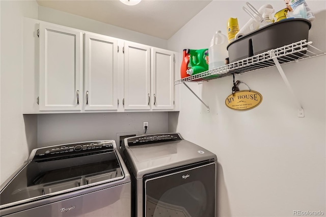 laundry area featuring cabinets and independent washer and dryer