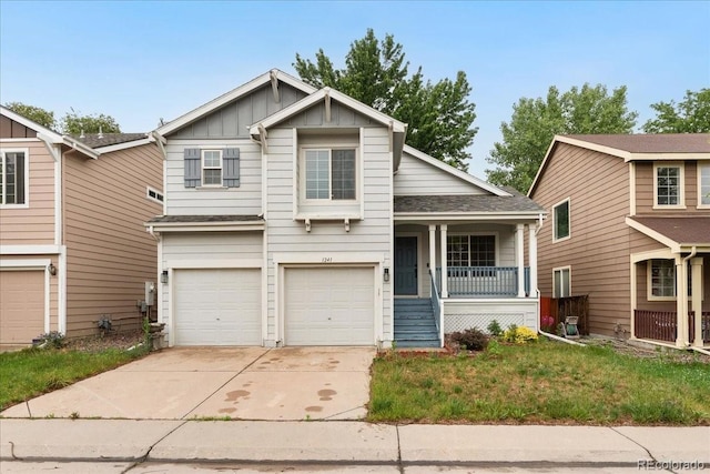 1241 S Akron Way, Denver, CO 80247 - view of front facade featuring a porch, board and batten siding, driveway, a garage, and roof with shingles