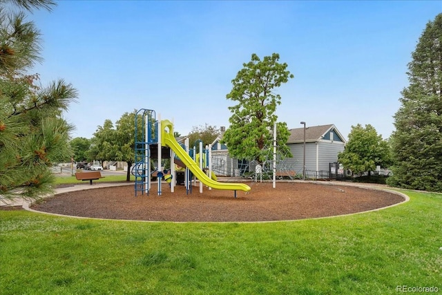 1241 S Akron Way, Denver, CO 80247 - community playground featuring a lawn