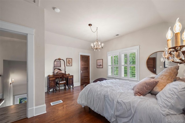 5675 S Crocker St, Littleton, CO 80120 - bedroom with a chandelier, wood finished floors, and baseboards
