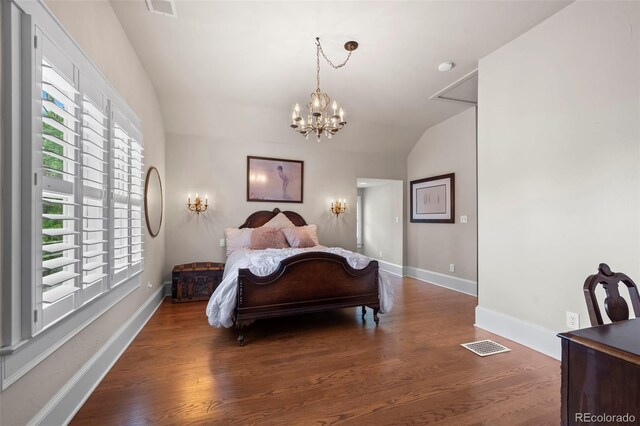 5675 S Crocker St, Littleton, CO 80120 - bedroom with a chandelier, wood finished floors, baseboards, and lofted ceiling