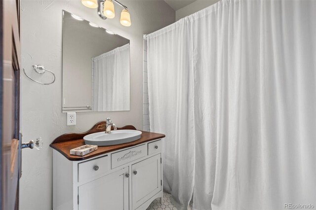 5675 S Crocker St, Littleton, CO 80120 - full bath with vanity and curtained shower
