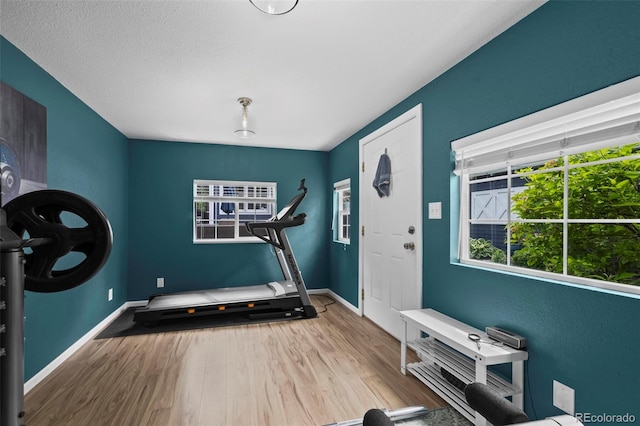 5675 S Crocker St, Littleton, CO 80120 - workout area featuring wood finished floors and baseboards