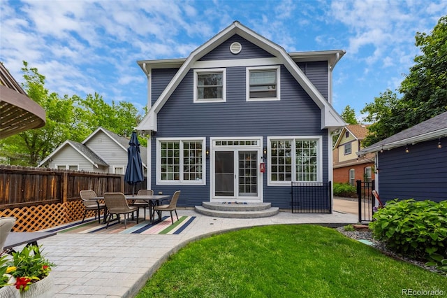 5675 S Crocker St, Littleton, CO 80120 - back of property with a patio area and entry steps