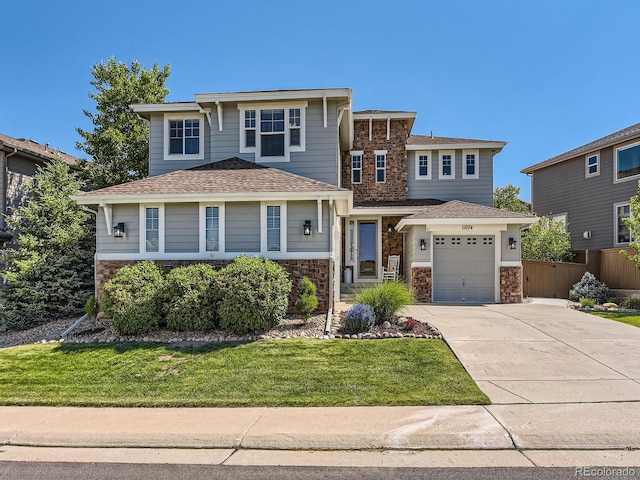 11074 Grayledge Cir, Highlands Ranch, CO 80130 - view of front of property featuring stone siding and concrete driveway