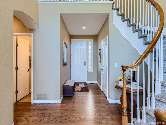 11074 Grayledge Cir, Highlands Ranch, CO 80130 - entryway featuring wood finished floors, stairs, and recessed lighting