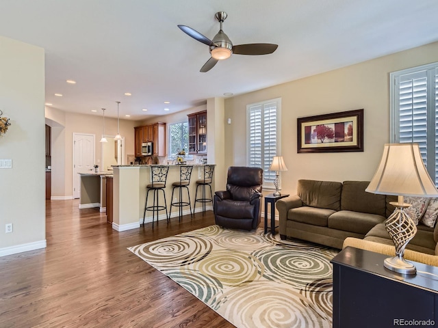 11074 Grayledge Cir, Highlands Ranch, CO 80130 - living room with ceiling fan, dark wood-style flooring, and recessed lighting