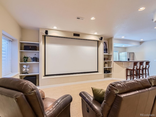 11074 Grayledge Cir, Highlands Ranch, CO 80130 - cinema featuring carpet floors, built in shelves, and recessed lighting