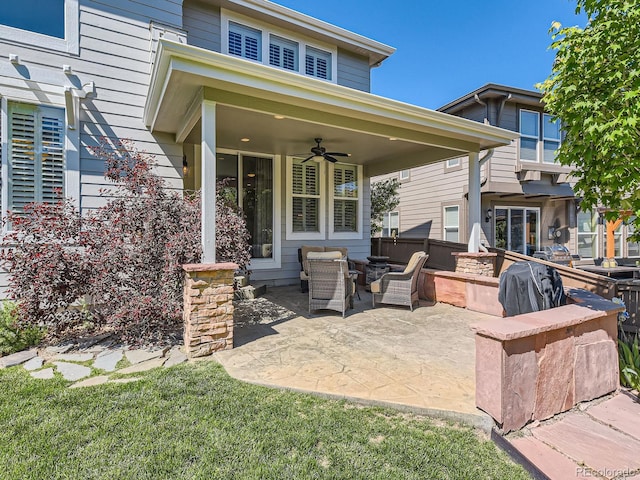 11074 Grayledge Cir, Highlands Ranch, CO 80130 - view of patio with a ceiling fan and a fire pit