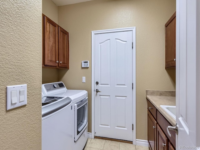 11074 Grayledge Cir, Highlands Ranch, CO 80130 - washroom featuring separate washer and dryer and cabinet space