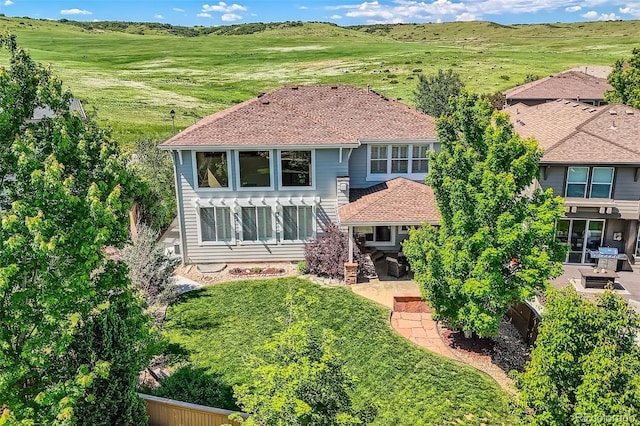 11074 Grayledge Cir, Highlands Ranch, CO 80130 - rear view of property with a patio