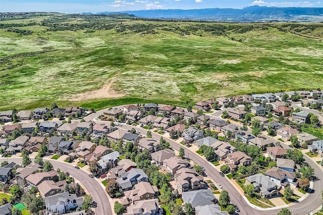 11074 Grayledge Cir, Highlands Ranch, CO 80130 - aerial perspective of suburban area featuring a mountain backdrop