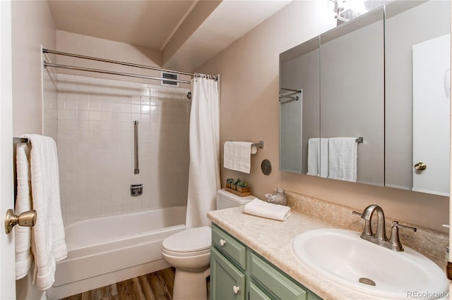 full bathroom with shower / bath combination with curtain, vanity, toilet, and wood finished floors