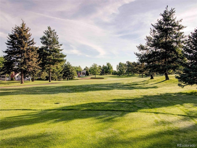 view of home's community featuring a lawn