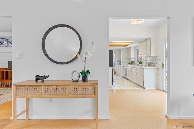 1420 E Bates Ave, Englewood, CO 80113 - hall featuring baseboards and visible vents