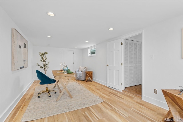 1420 E Bates Ave, Englewood, CO 80113 - living area with baseboards, recessed lighting, and wood finished floors