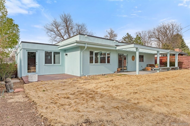 1420 E Bates Ave, Englewood, CO 80113 - rear view of property featuring a patio