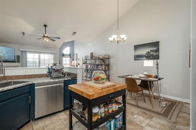 kitchen with visible vents, lofted ceiling, blue cabinetry, a sink, and dishwasher