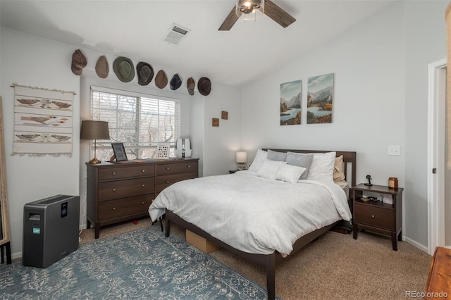 carpeted bedroom with vaulted ceiling, a ceiling fan, visible vents, and baseboards